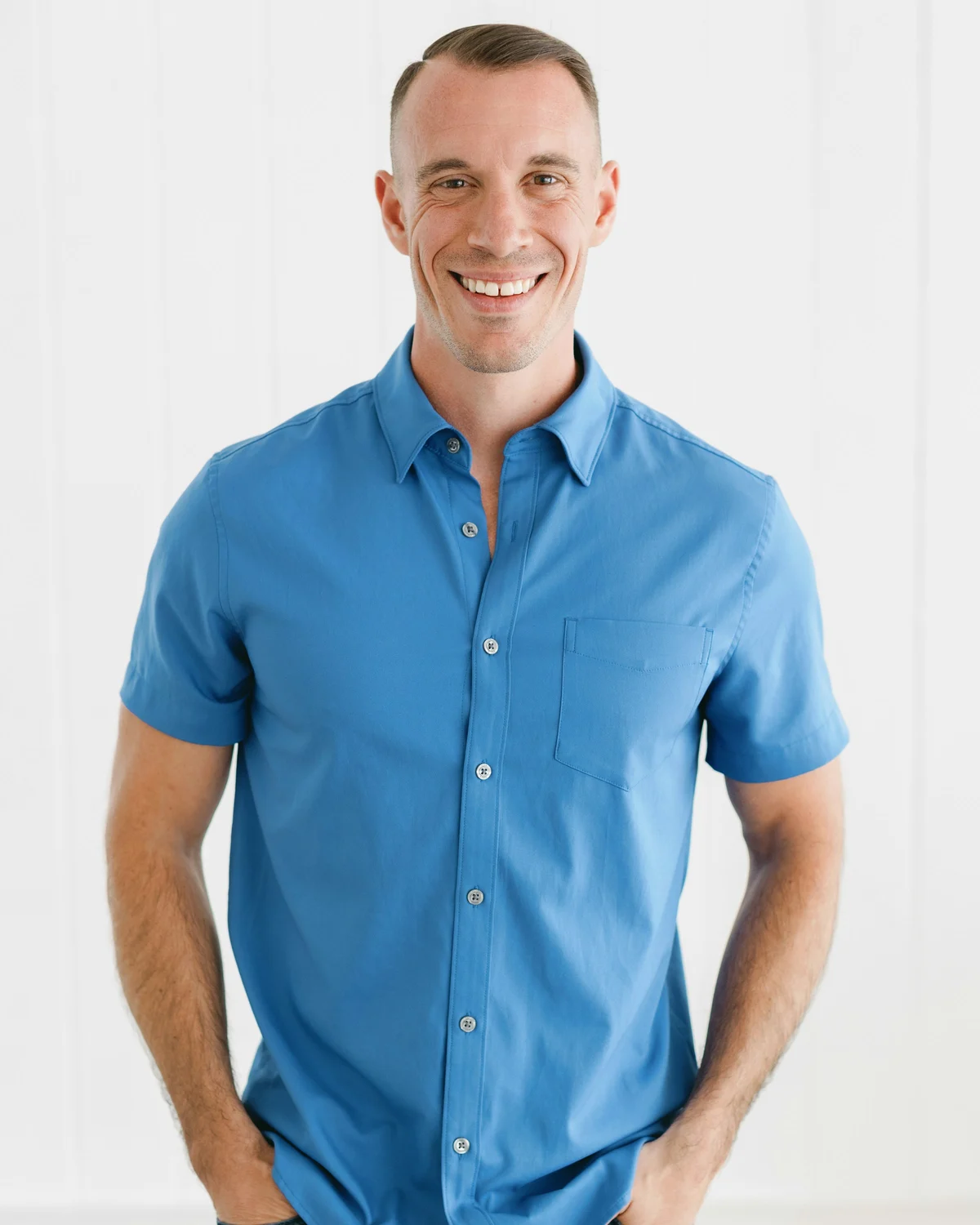 Audience portrait: man in a blue shirt